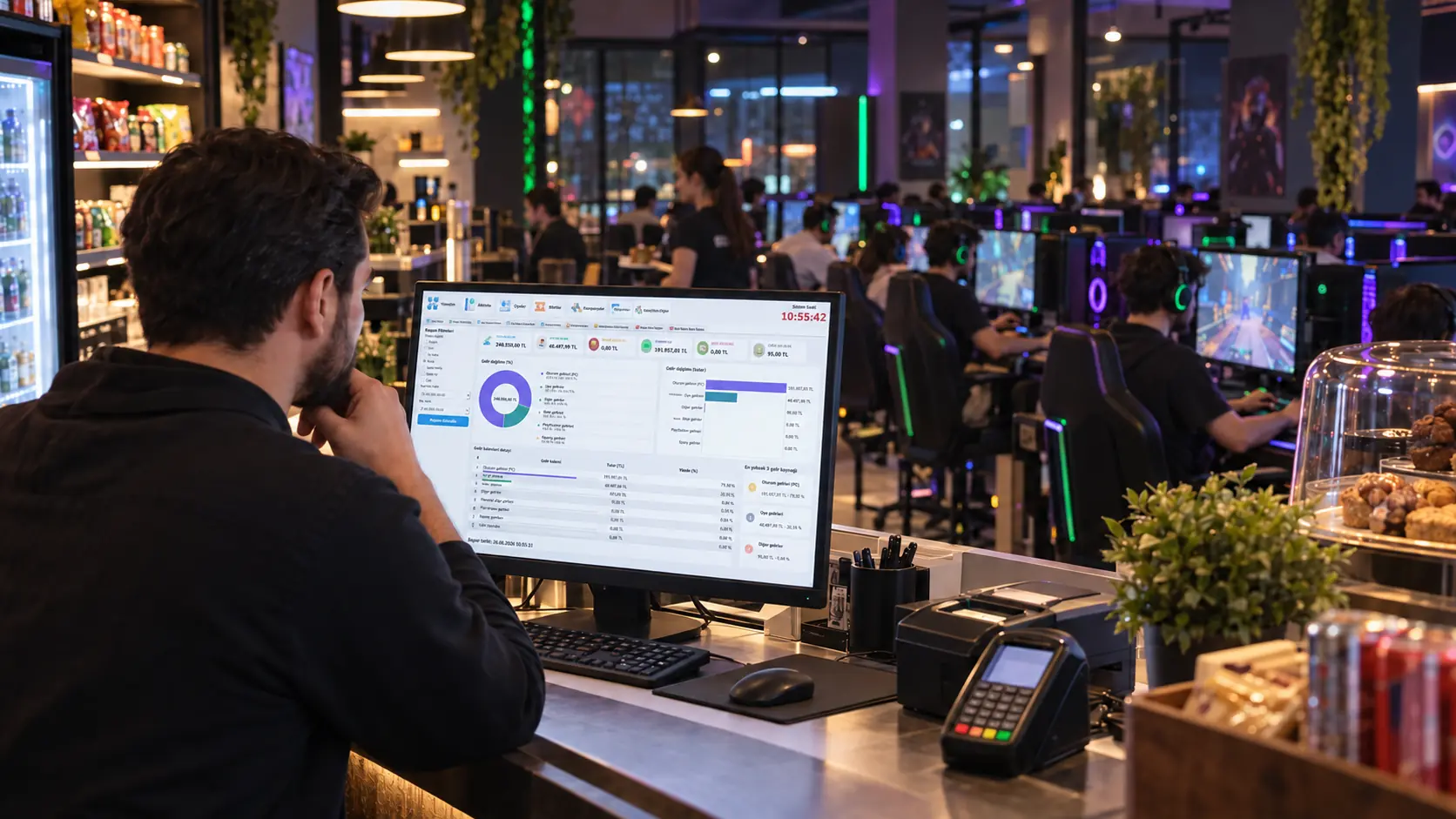 Manager reviewing a revenue report in a gaming cafe